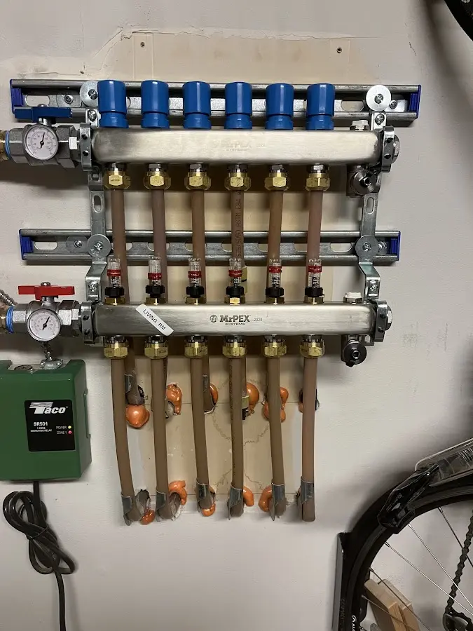 Plumber performing Leak Detection at a residential property in Fitchburg